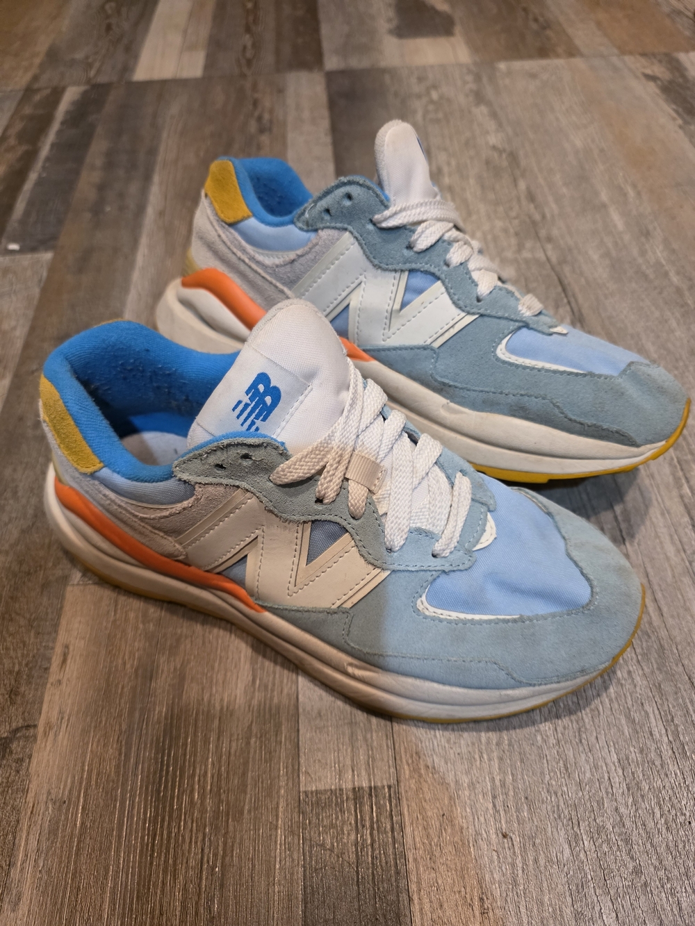 New Balance Light Blue & White Suede Sneakers with Orange Accent